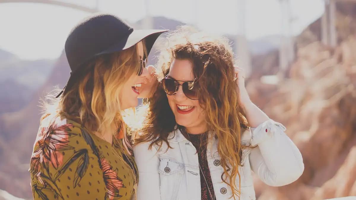Two colleagues laughing together