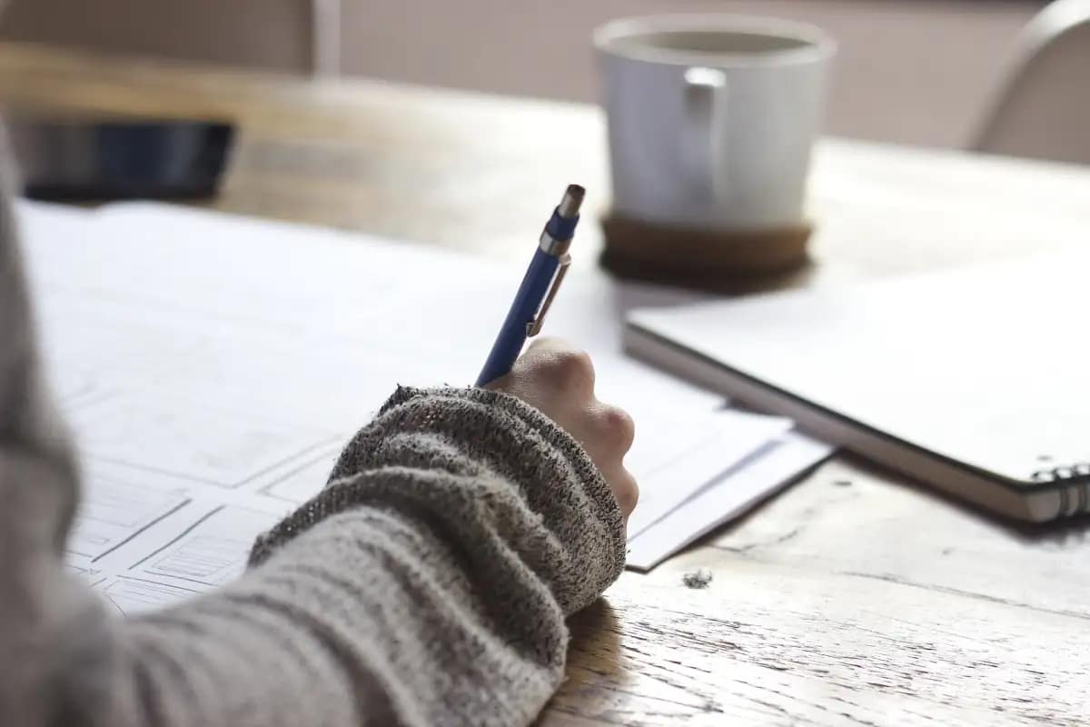 Designer sketching a website homepage