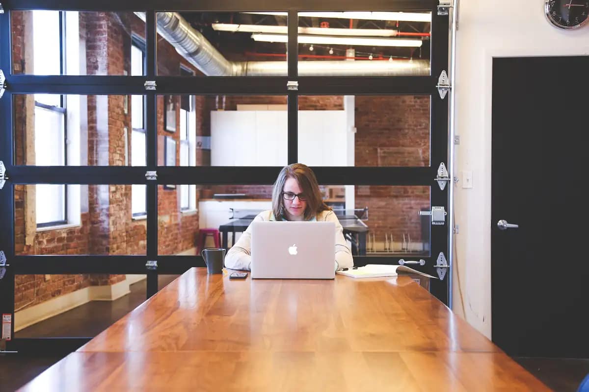 Small business owner checking a dashboard on a laptop