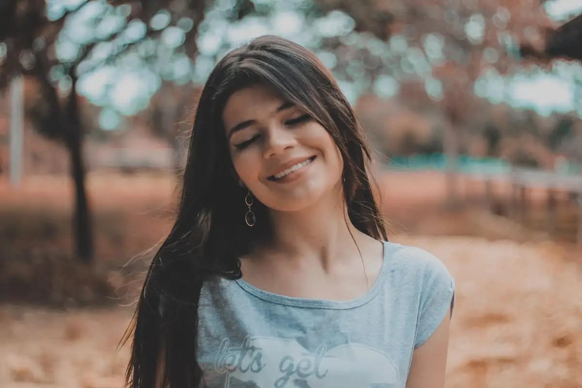 Smiling young woman outdoors